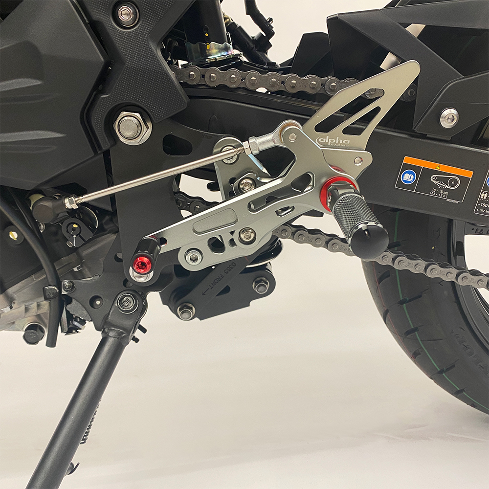 >TRACK< footrest assembly, black, Kawasaki Ninja 400 from 2018 / Z400 from 2019 ABE