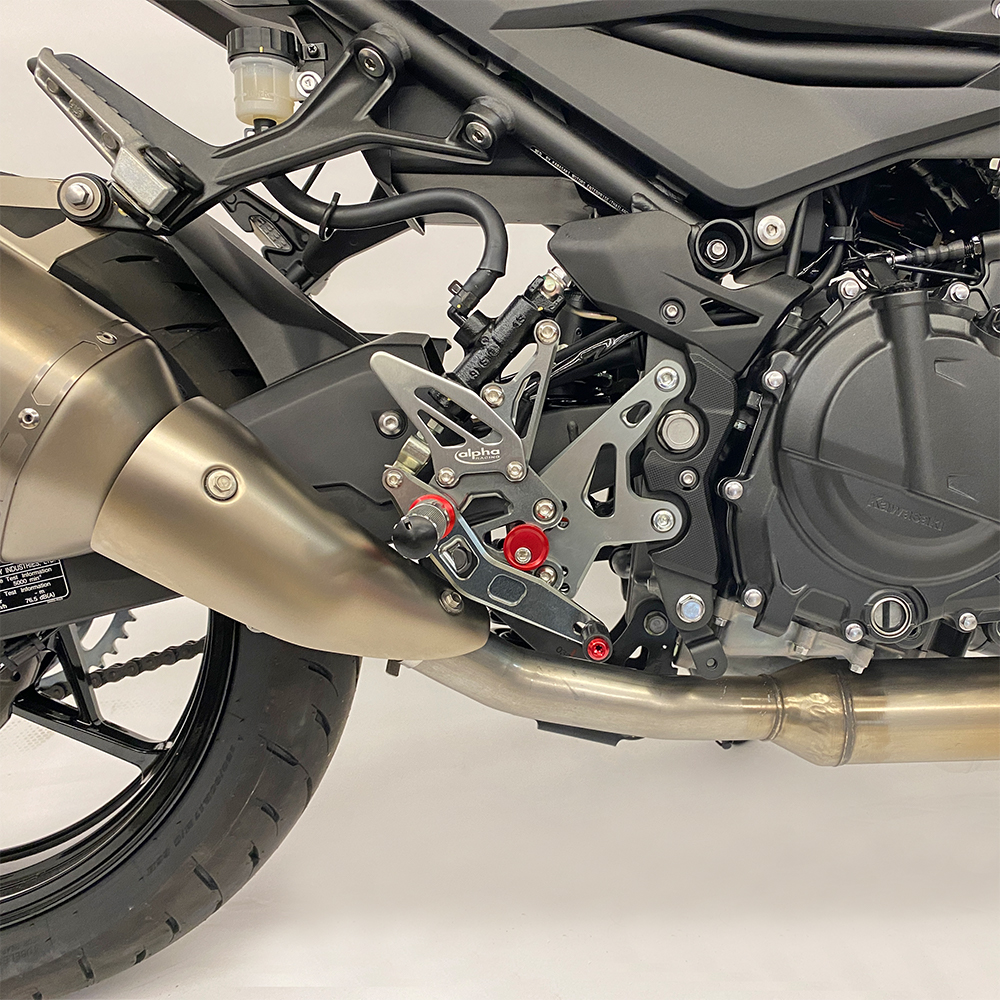 >TRACK< footrest assembly, black, Kawasaki Ninja 400 from 2018 / Z400 from 2019 ABE